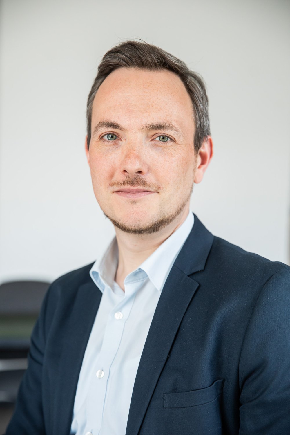 Ein Porträt-Foto von Benajmin L.